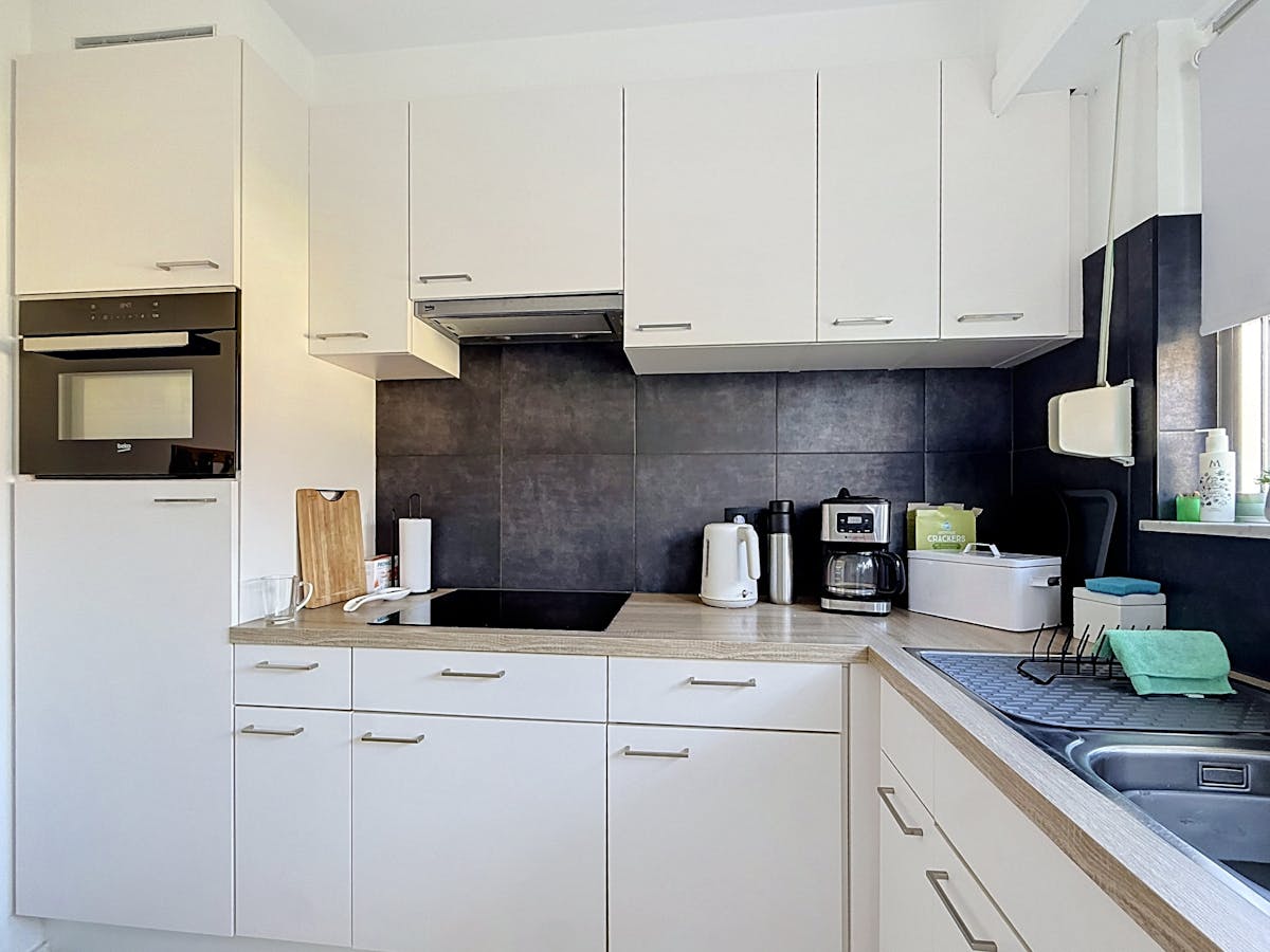 Gelijkvloers appartement te huur met tuin in Merksem - foto 5