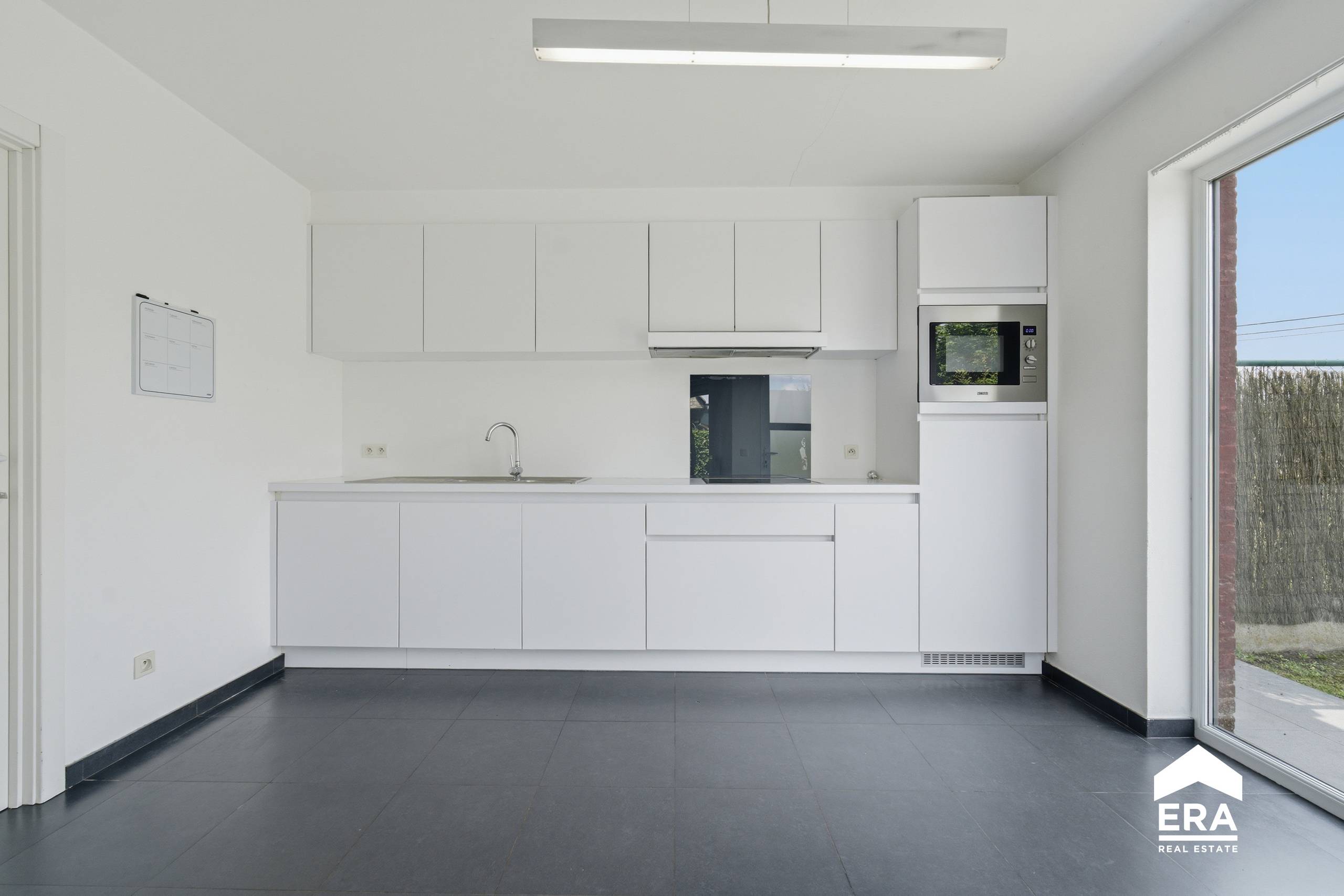 Halfopen instapklare woning met garage en tuin in Dadizele - foto 5