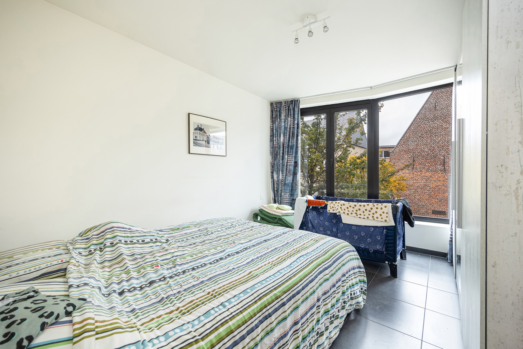 Energiezuinig appartement op de 1ste verdieping met 2 slaapkamers, terras en autostaanplaats. - foto 5