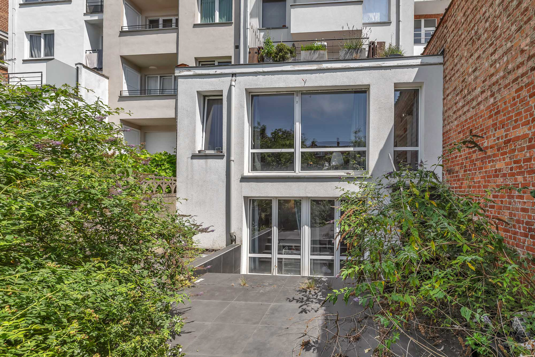 Duplex met 3 slaapkamers en tuin te Etterbeek - foto 5