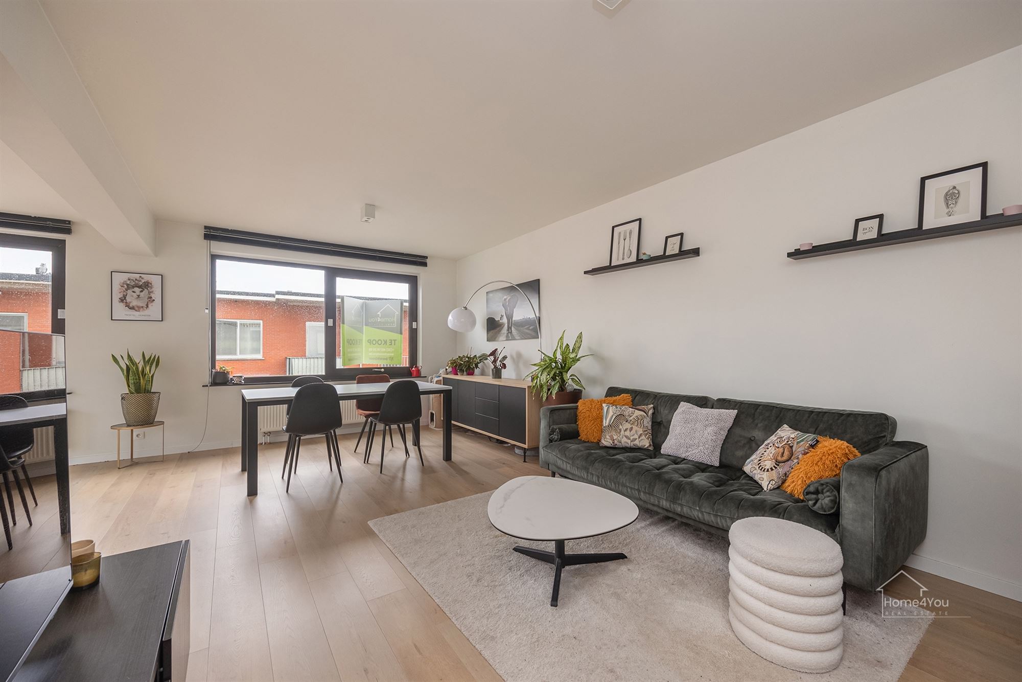 Ruim en lichtrijk appartement met terras + autostaanplaats - foto 4