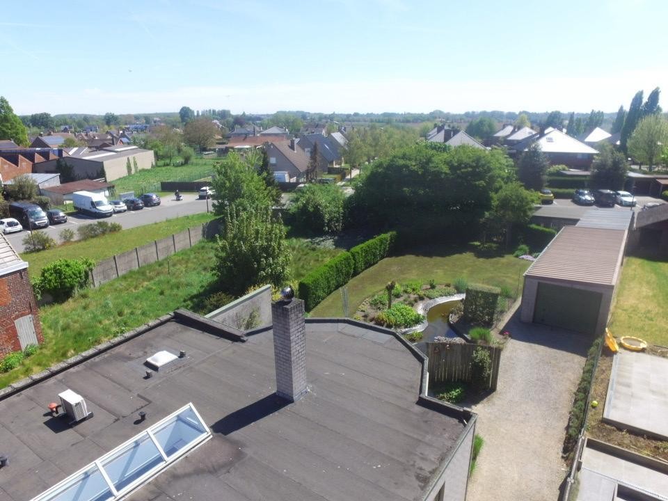 Handelswoning met bouwmogelijkheden achteraan - foto 2