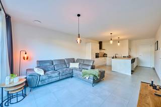 Energiezuinig gelijkvloers appartement met terras en tuin, zonnepanelen, 1 slaapkamer en ondergrondse parking op een rustige locatie in het...