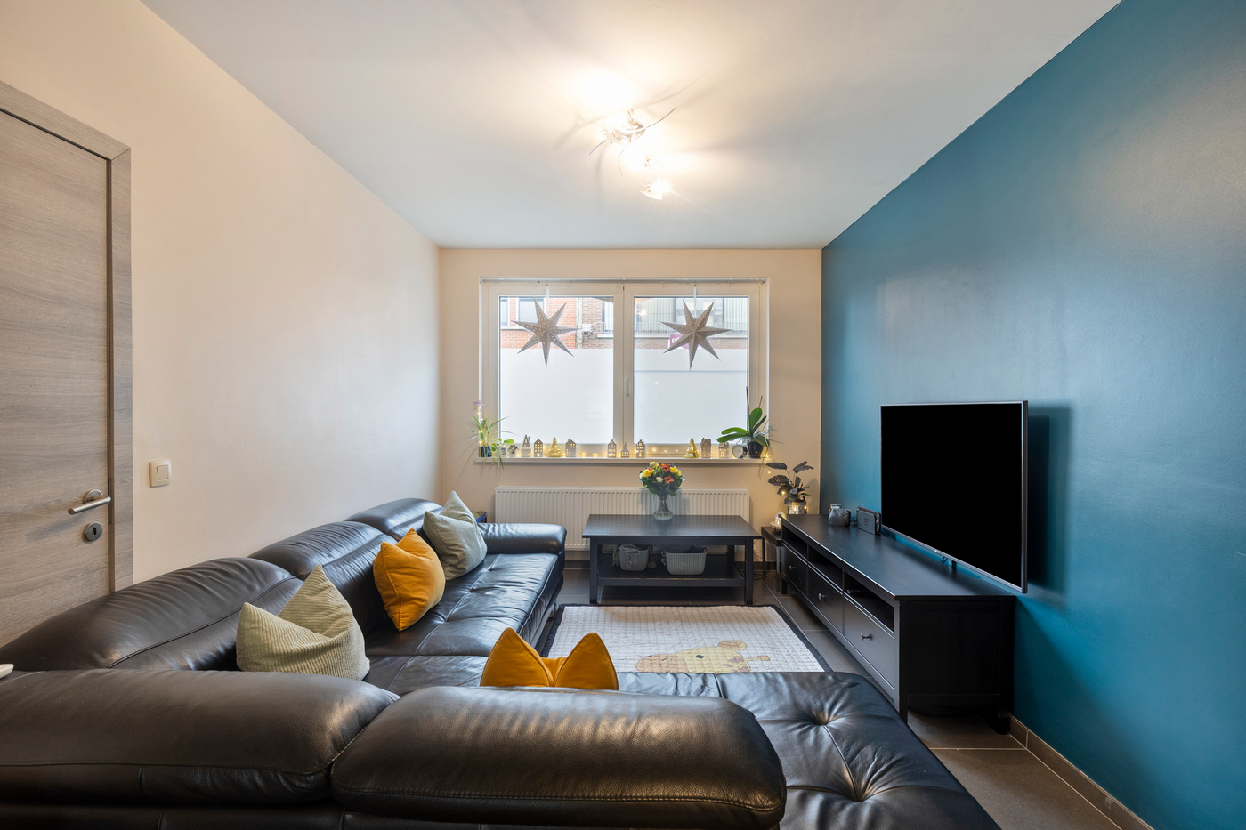 Instapklare gezinswoning met 3 slaapkamers, fietsenberging en tuin in Kruibeke - foto 4