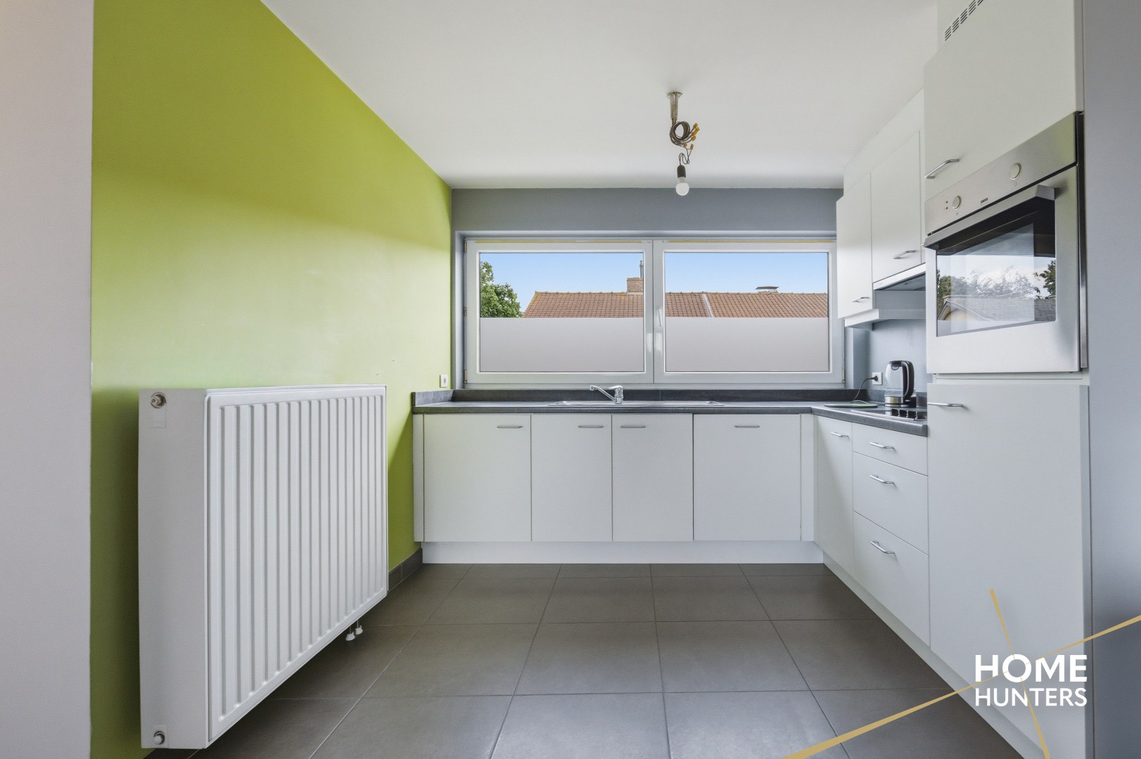 Opbrengsteigendom, bestaande uit 2 appartementen, in het centrum van Staden - foto 4