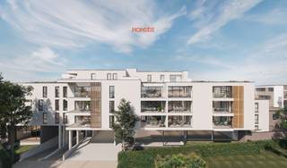 Gelijkvloers commercieel handelspand met brede en hoge vitrines, gelegen in residentie “August”, de laatste fase van het prestigieus...