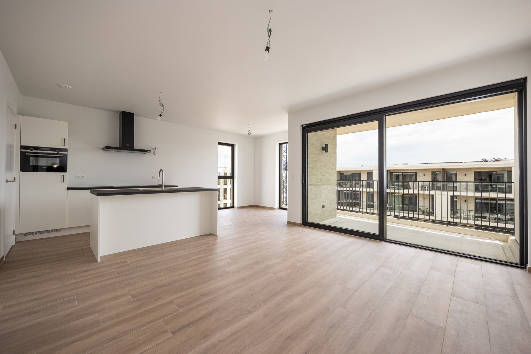 Prachtig nieuwbouwappartement op de 3de verdieping met ondergrondse autostaanplaats en berging. - foto 2