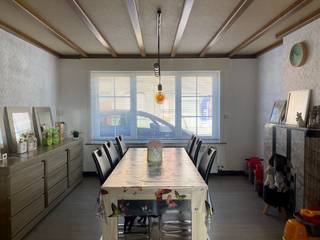 Centraal gelegen woning met grote garage.De woning bestaat uit:Gelijkvloers: Inkomhal - leefruimte met zit- en eethoek - eetplaats - veranda - keuken...