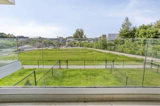 New construction project Corpark in Boom: the apartments are completely ready! There are only 6 ready-to-move-in homes available. Come and discover these last units, including the show house, quickly.Each apartment (1-2 bedrooms, sunny terrace, ground floor with garden) has a “key on the door” finish with an eye for detail, a timeless style and all modern comfort. Sustainability is key: all apartments are Nearly Energy Neutral (E20, fiscally advantageous) thanks to individual solar panels, floor heating with heat pump and ventilation system D. We have consistently worked with sustainable, high-quality materials.Corpark in Boom is ideally located, within cycling and walking distance from the center. The municipality is very centrally located: Antwerp, Brussels, Mechelen and Lier are within 20 minutes of travel time, thanks to the connection to the A12 and E19. Boom station is nearby, so ideal for commuters. The nearby bus stops provide an optimal connection to public transport to Antwerp, Mechelen and Brussels. Moreover, it is quietly located near the banks of the Rupel.This 2-bedroom apartment of approximately 87 m² is located on the first floor of block B, located in Corpark at Lange Lei 1 Layout: - entrance hall with guest toilet - bathroom - living room with open kitchen- 14 m² rear terrace- storage - bedroom 1 - bedroom 2 - front terrace of 12 m²Possibility to purchase below 6% VAT if the conditions are met. A new apartment is more than just four walls — it's a place where you want to feel at home. That's why we're happy to help you, with an interior check of €2,000.00, to fully tailor your interior to your tastes and needs. Jens Mariën, experienced interior designer, guides you in making the right choices in terms of layout, color, materials and furniture. This is how you create a home that is not only practical and comfortable, but also perfect for you. Contact us today for more information about this unique new construction project in Boom at 03 888 38 88 or boom@dewaele.com