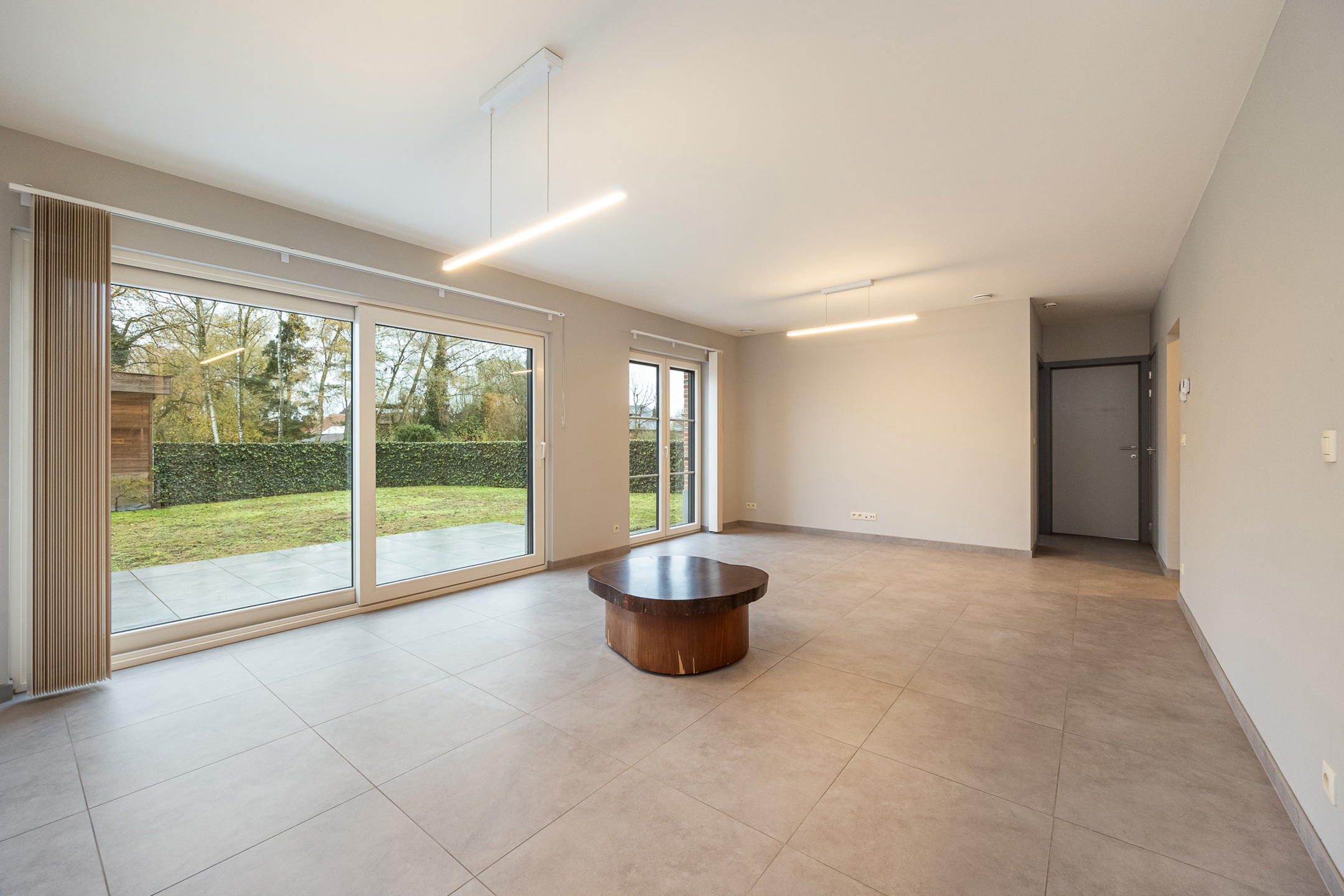 Recent gelijkvloers appartement van 80m² met 2 slks, tuin, garagebox, autostaanplaats en kelderberging. - foto 4