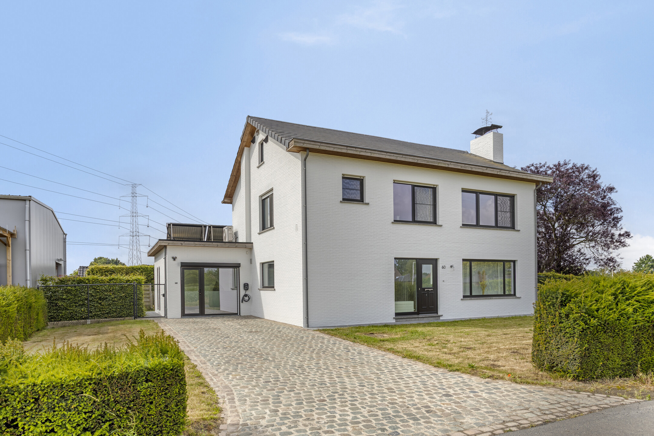 Landelijk gelegen woning met magazijn van 280m² en weiland. - foto 3