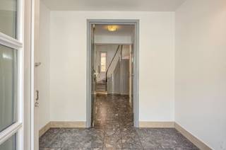 Layout:Ground floor:- Spacious entrance hall- Two spacious indoor garages with automatic gates- Two practical storage spaces (including one with a connection for washing machine and dryer)- Pleasant terrace (34m²)Floor 1:- Large, open living space- Kitchen with direct access to the second terrace- Bedroom 1- Separate guest toiletFloor 2:- Night hall with built-in cupboards- Bedroom 2- Bedroom 3- Bedroom 4- Bedroom 5- Bathroom with walk-in shower, sink and toiletDetails:- Exceptionally spacious family home with a living area of 233m²- Unique façade width of 9 meters- Two indoor garages (rare in this neighborhood)- Favourable EPC label B (no renovation obligation)- Double glazing everywhere- Total of 5 full bedrooms- Very central location in Antwerp-Kiel, right by the A12 and the Antwerp Ring- Shops and schools a short walk awayRegister of measures: pending