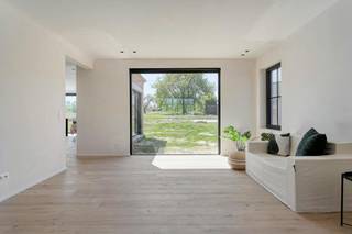 This exclusive villa is located on a spacious plot of 3,100 m² in rural Welden (Oudenaarde). In 2025, this property underwent a major total renovation. This resulted in an EPC label A and a high-end, classy interior.<br /><br />Ground floor:<br />We enter the house through the entrance hall with guest toilet. The bright living space is spacious and finished with a parquet floor. The large windows here ensure constant interaction with the expansive garden. An adjoining office space also offers the ideal place for those who want to efficiently combine living and working. In the exceptionally large kitchen, the spacious kitchen island is the eye-catcher. In the dining area, thanks to the almost complete glass walls, you can enjoy a panoramic view of the greenery. Furthermore, on the ground floor, there is a spacious laundry room and access to the basement. <br /><br />First floor: <br />On this floor, we find three full bedrooms, each with beautiful views. <br />The bedrooms still need to be finished. <br />The luxurious bathroom is timeless with a freestanding bath, a spacious walk-in rain shower and a sophisticated double washbasin. Finally, in the night hall, there is a separate toilet and custom closets are provided. <br /><br />Second floor: <br />The second floor is accessible via a fixed staircase and offers a spacious attic space. This attic offers considerable potential for the creation of additional bedrooms or hobby space.<br /><br /><br />Register of measures: no