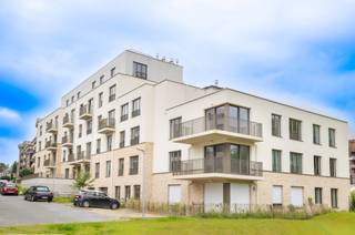 BERCHEM-SAINTE-AGATHE, gelegen in een residentiële wijk op de 1e verdieping van een elegant nieuwbouwproject dat deel uitmaakt van het project...