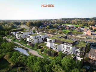 **E-PEIL onder 10**6%BTW**Dit appartement maakt deel uit van het woonproject d<em>e Bomen</em>, gelegen aan de rand van het gezellige Testelt. Omringd door natuur en met een prachtig zicht, biedt dit appartement een combinatie van rust, modern comfort en duurzaamheid. Het appartement bevindt zich op de gelijkvloerse verdieping en heeft een oppervlakte van ruim 119 m². De indeling omvat een inkomhal met gastentoilet en een lichtrijke woonkamer met een open keuken met naadloze toegang tot het zuidgericht terras van 39m<sup>2</sup>. Het appartement beschikt verder over twee ruime slaapkamers van maar liefst 20m<sup>2</sup> en 12m<sup>2</sup> die eveneens toegang hebben tot de buitenruimte. De badkamer biedt u de keuze tussen een inloopdouche en/of een ligbad. Residentie Beuk combineert hedendaagse architectuur met een kleinschalige opzet, perfect passend in het dorpsbeeld van Testelt. Dit appartement wordt nog volledig naar uw smaak ingericht, met volledige keuzevrijheid naar materialen en ruime afwerkingsbudgetten. U navigeert tevens ook makkelijk naar de overdekte parkeerstraat met bergruimten op het tuinniveau. Wij nodigen u graag uit voor een kennismakingsgesprek, met toelichting van het project en volledige kostenraming. Ideaal als investeringsopportuniteit of voor eigen bewoning. Plan uw werfbezoek of vraag meer informatie aan via Info@homies.be of 016 22 82 22.