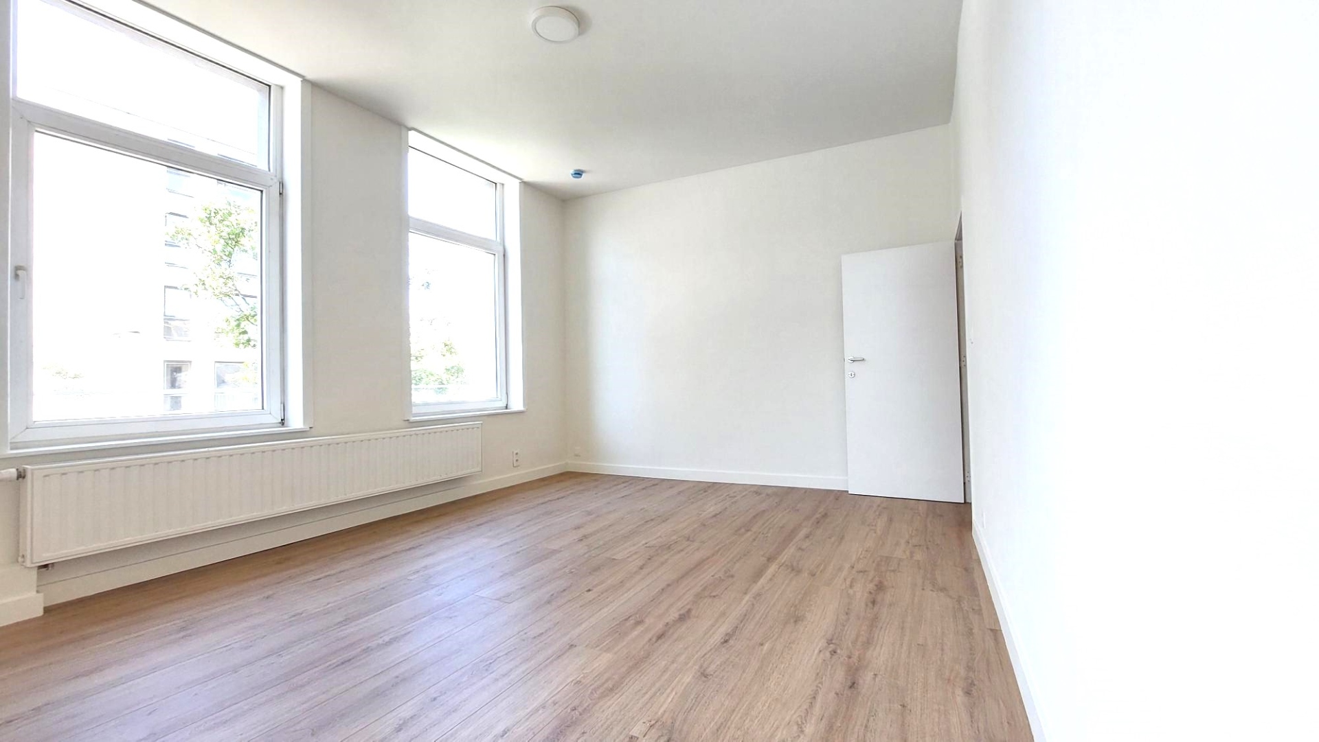 Triplex appartement met 2 slaapkamers en zonneterras te Oostende - photo 4