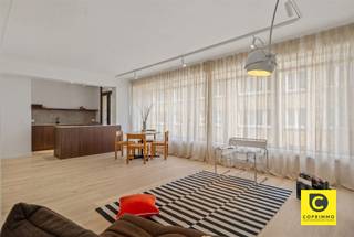 <p><span>ON THE MARKET! 3-bedroom apartment in need of renovation in a prime location in Oud Berchem!#</span><span>NewLine#This spacious and light-filled apartment, featuring many authentic elements, is just a stone’s throw from Harmonie Park and close to PAKT, an initiative by creative entrepreneurs and urban farmers focused on greener living, self-sufficiency, culture, and gastronomy. Shops, parks, schools, restaurants, and sports facilities are all nearby, as is Antwerp’s vibrant city life, and accessibility is excellent thanks to various access roads and public transportation. This gem-in-the-making is located on the</span><span><sup>2nd</sup></span><span> floor of a well-maintained, small-scale building with an elevator. After renovation, this diamond in the rough will undoubtedly be a highly sought-after home base for anyone who enjoys everything the city has to offer.</span></p><p><span> </span></p><p><span>The current layout is as follows:</span></p><p><span><br />Entrance hall, living area, kitchen &amp;, storage room:</span></p><p><span>The entry hall, equipped with a videophone, features distinctive checkerboard parquet flooring and offers ample space to install a coat closet. The spacious living area (34 m²), also featuring parquet flooring, enjoys plenty of natural light and includes charming authentic elements (moldings, decorative fireplace, curtain closets, wide marbled window sills). An open kitchen with a cooking island is practically a must and is easy to create since the wall between the two areas is non-load-bearing. This will further highlight the natural light, the sense of space, and the cozy terrace. The storage room next to the kitchen is the perfect spot for a separate laundry room with extra storage space. </span></p><p><span> </span></p><p><span>Bedrooms, bathroom &amp;, and toilet:</span></p><p><span>The apartment has 3 bedrooms, 2 of which are very large and one smaller room that is also ideal as an office, hobby room, guest room, etc. The "vintage" bathroom features a bathtub/shower, double sink, toilet, and a connection for the washing machine. During renovation, it’s perfectly possible to combine a spacious walk-in/rain shower with a modern double vanity and/or a designer bathtub.  </span><span><br /><br />Terraces, basement, and bike storage:</span><span><br />The kitchen provides access to the cozy indoor terrace at the front, where you’re always sheltered from the elements. The additional storage room is also very practical. At the quiet rear of the building lies the extra-wide south-facing terrace. With a touch of natural beauty to top it off, this is a phenomenal spot to completely unwind after a busy workday, whether or not with a good glass of wine in hand. It’s a unique opportunity to dine al fresco, relax in the lounge, or garden at this height right in the heart of the city every day. Also worth noting is the private, dry basement storage unit (4 m²), which is included in the price. In addition, the building features a bike storage area where your bike will always be kept dry and safe.</span></p><p><span><br />Additional highlights:</span></p><p><span>- Prime location (Mobiscore 9.5/10)</span></p><p><span>- Character and authenticity</span></p><p><span>- Asbestos-free</span></p><p><span>- 2 terraces</span></p><p><span>- 3 bedrooms<br />- Basement</span></p><p><span>- Bike storage</span></p><p><span> </span></p>