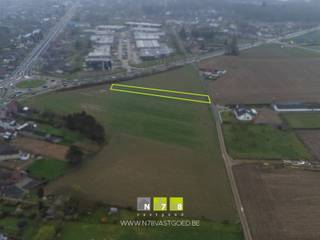 PERCEEL LANDBOUWGROND VAN 6A10CA TE DILSEN.Dit perceel grond met een oppervlakte van 6 are 10 centiare bevindt zich in agrarisch gebied aan de...