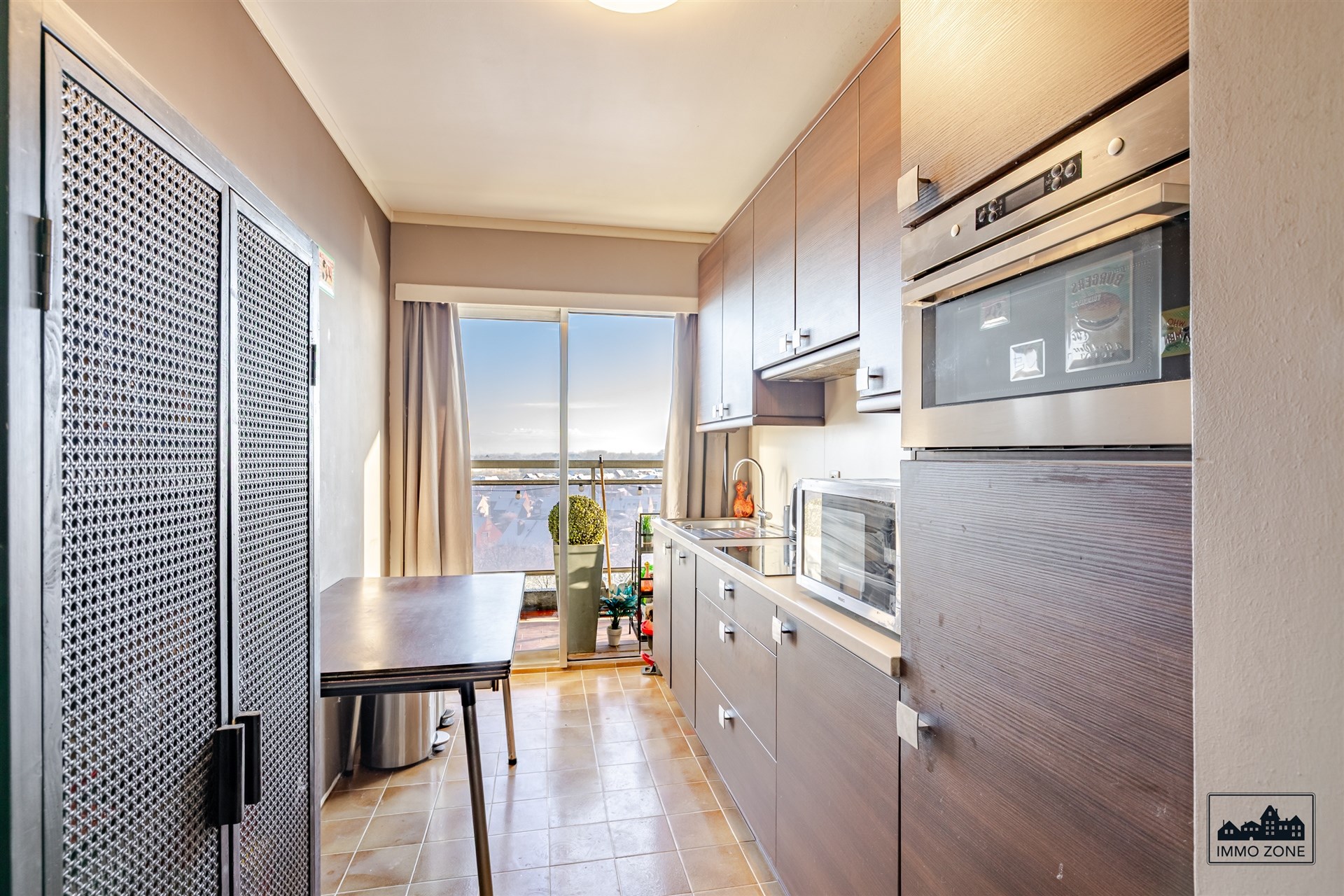 Ruim appartement met groot terras in Sint-Niklaas - foto 4