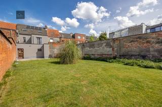 Te koop: stijlvol gerenoveerd en energiezuinig duplexappartement met tuin (3 slpks - 129 m²)Ontdek dit prachtig volledig gerenoveerd...