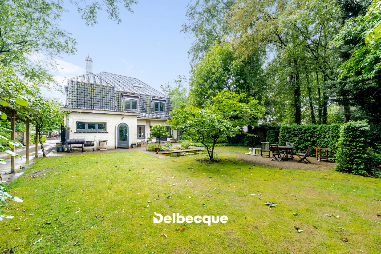 Karaktervolle villa in interbellumstijl op ruim perceel in gegeerde villawijk te Sint-Kruis - foto 2