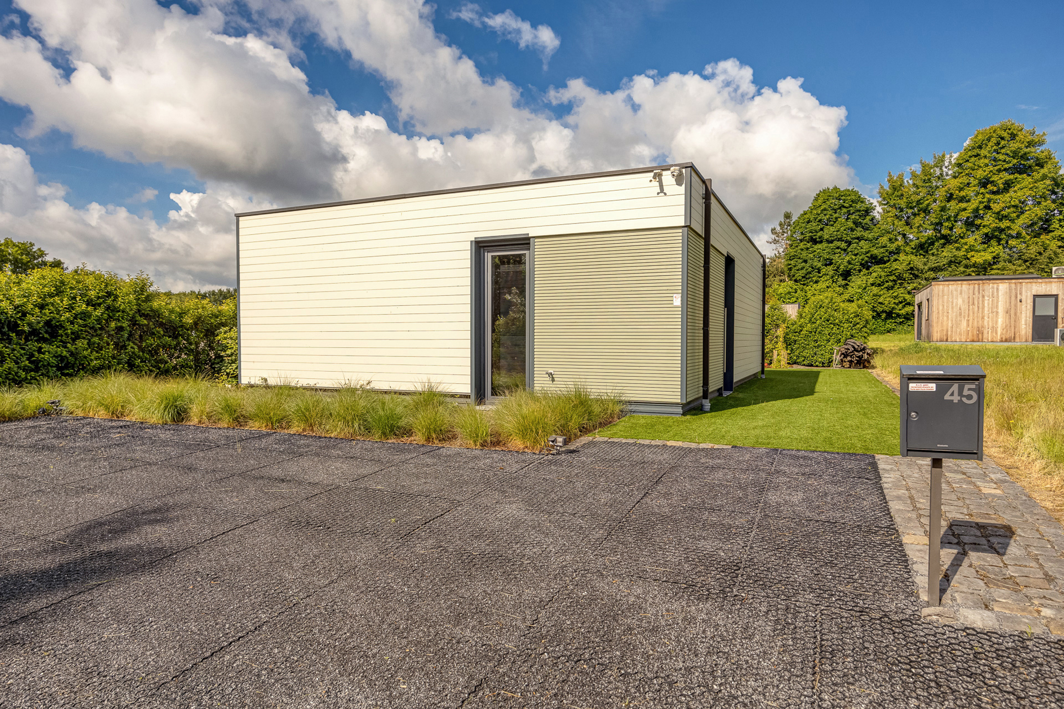 Luxebungalow met aangelegde tuin in groene omgeving - foto 3