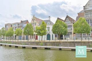 <p><span>Fully serviced “luxury” ground floor apartment in the Historic center of Mechelen</span></p><p><span>This luxury apartment is located in a most beautiful renovated 18th century 'Landmark' Building, situated in the Historic center of Mechelen overlooking the Dijle River. </span></p><p><span>The apartment is newly renovated and has been finished to the highest standards using carefully selected furnishings and fine art, making you feel at home. It comes with a complete installed and equipped kitchen, a spacious living room, a home-office, 2 bedrooms, an en-suite bathroom (with bath & separate shower), a cute courtyard and a basement. </span></p><p><span>The monthly rental price is € 1.975 with the option to rent a secured parking space (at € 100/month) in an underground car park next-door. </span></p><p><span>The rental price includes weekly cleaning and linen service, the electricity charges for the common areas, maintenance, elevator costs, gardening, etc.</span></p><p><span>This fully serviced apartment is perfectly suited for expats or tenants looking for that extra touch of care.</span></p><p><span>Are you interested in renting this apartment? Do not hesitate and contact us on 015/20.20.82 or <span>info@demakelaardij.be</span></span></p><p><span>We look forward to welcoming you soon.</span></p><p><span> </span></p>