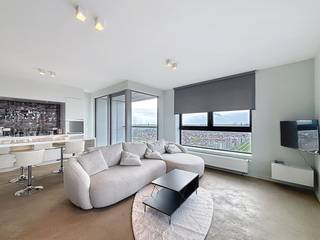 Wonen op hoog niveau op het Eilandje op de 19e verdieping met adembenemend zicht op de jachthaven. Welkom in dit stijlvol gemeubelde appartement...