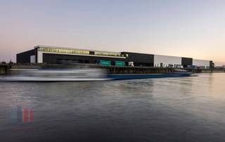 Strategisch gelegen logistieke loods met een oppervlakte van +/- 3.500 m² te huur in industriezone De Hulst tussen de op- en afrit 6...