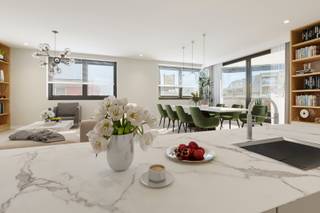 <span><span>Kleinschalige en energiezuinige '<strong>Residentie Le Vieux Charles'</strong>, bestaande uit <strong>5 prachtige en ruime appartementen.</strong><br />In het hartje van Poelkapelle, <strong>uitkijkend op het Guynemerplein</strong> vinden we deze kleinschalige en <strong>uiterst energiezuinige </strong>'Residentie Vieux Charles', bestaande uit 4 ruime appartementen en één penthouse. Onderaan bevindt zich een kwalitatieve bakkerij en chocolade zaak. De residentie bevindt zich meerbepaald op de hoek van de Brugseweg en de Wallenmolenstraat. <br /><br />Dit prachtig gelegen nieuwbouwproject beschikt over vier ruime appartementen met telkens 2 slaapkamers en een totale oppervlakte van 110 m² tot 117 m².  Daarnaast beschikt elk appartement ook over min. één groot terras van 8 m² tot 17 m². Verder heeft u momenteel nog vrije keuze in de afwerking van de keuken (Dovy-Ieper), badkamer en de vloer van uw appartement. Ook worden deze lichtrijke appartementen uitgerust met vloerverwarming aangestuurd door een warmtepomp (via warmtenet: innoverende technologie). Het regenwater wordt maximaal opgevangen in grote ondergrondse <strong>buffertanks (3x 15.000 Liter). </strong><br /><br />Bereikbaarheid, oriëntatie, uitzicht, beleefbaarheid, woonkwaliteit, rust, cultureel aspect, historiek, degelijkheid met hoge afwerkingsgraad, architecturaal concept, energiek aspect... zijn termen die het ontwerp van het project 'Residentie Le Vieux Charles' bepaald hebben.<br /><br /><strong>!! Aankoop aan het voordeel-tarief van 6% is mogelijk !!</strong><br /><br /><u><strong>Extra:</strong></u></span></span>
<ul>
	<li><span><span>Ruime budgetten voorzien voor keuze afwerkingsmaterialen;</span></span></li>
	<li><span><span>zeer energiezuinige appartementen;</span></span></li>
	<li><span><span>aangesloten op een intern warmtenet (uniek) - vloerverwarming en warmtepomp;</span></span></li>
	<li><span><span>unieke ligging;</span></span></li>
	<li><span><span>...</span></span></li>
</ul>
<span><span> Voor meer informatie omtrent de oplevering van de verschillende appartementen, gelieve contact te nemen met één van onze makelaars.<br /><br />Bent u op zoek naar een prachtig en ruim appartement met 2 slaapkamers en een leuk leefterras in een kleinschalige residentie? Plan dan snel uw bezoek! Contacteer ons op het nummer 051 50 11 51 of per mail via diksmuide@diksimmo.be.</span></span>