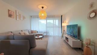 This energy-efficient and recent apartment in Kuringen is offered for rent and is the perfect home for those looking for modern comfort. Renting out this property offers a unique opportunity to enjoy a peaceful environment with close proximity to a bustling city. <br /><br />In addition, the building offers extra comfort with a communal laundry area equipped with washing machines and dryers. On floor -1, you have a private car park, a basement shed and a communal bicycle shed.<br /><br />The location in Kuringen is an absolute asset. All facilities such as schools, shops and public transport are within walking distance. In addition, there is a smooth connection to the motorway, which is ideal for commuters. <br /><br />The layout of the apartment is as follows:<br /><br />Ground floor: <br /><br />- Entrance hall<br />- Bright living space<br />- Fully equipped kitchen<br />- 2 bedrooms<br />- Bathroom with modern shower <br />- Separate toilet <br />- Practical storage<br />- Pleasant terrace<br /><br />Floor -1:<br /><br />- Basement storage<br />- Parking space<br />- Community bike shed<br /><br />The quickest way to visit this property? Request your visit via the red button on our website (www.dewaele.com).<br /><br />No appointments can be made by phone. For other questions, you can contact us by phone at 011 30 50 50.<br /><br />See you soon<br />