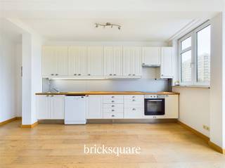 SCHAERBEEK - Discover this apartment in excellent condition, ideally located in the Meiser district of Schaerbeek, close to all shops, schools and public transport. The main roads provide quick access to the city center and surrounding areas, allowing you to enjoy a calm yet dynamic lifestyle.This 80 m² apartment, located on the 3rd floor of a residence, will seduce you with its attractive location, spaciousness and brightness. It comprises an entrance hall, a large, bright living room with a super-equipped kitchen, two comfortable bedrooms, a toilet and a bathroom. There's also a cellar in the basement.The building boasts a number of assets, including the recent renovation of the roof. In addition, photovoltaic panels have been installed to maximize energy efficiency. The condensing boiler ensures efficient, economical heating.EPC B-, double-glazed windows, compliant electricity and entry phone, bike roomAsking price: €270,000Available immediately.Contact BrickSquare for more information: 02/315.25.13 or www.bricksquare.be