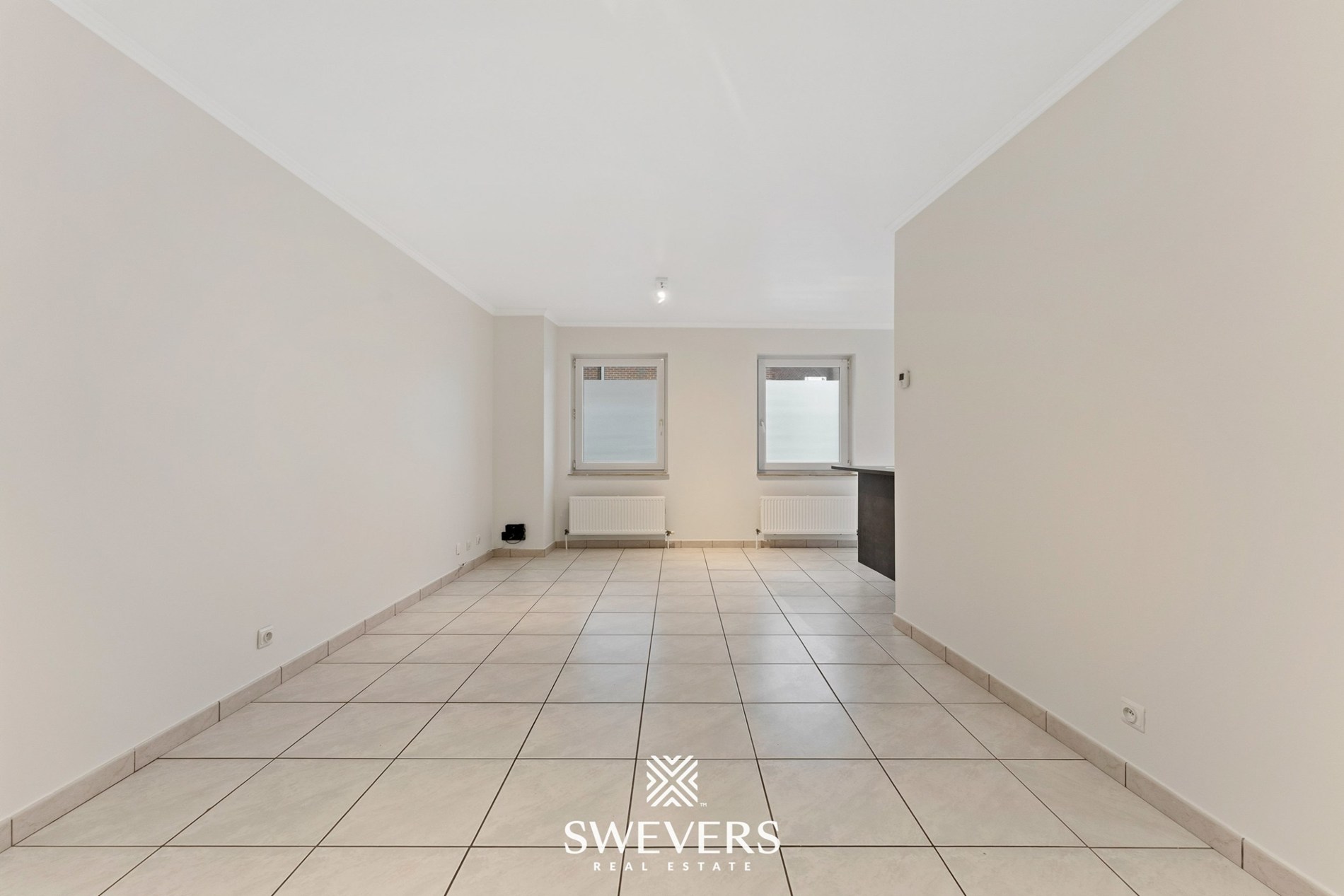 Ontdek dit instapklaar, energiezuinig en verrassend ruim gelijkvloers appartement in het charmante Zichem - foto 3