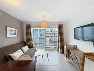 Cozy one bedroom apartment for rent with a sunny terrace. The apartment is located on the second floor of the residence... The apartment is very centrally located, near the Zeedijk, shops and restaurants.<br /><br />Layout:<br />- entrance hall (... m2)<br />- living room with open kitchen with (... m2)<br />- bathroom (... m2) with <br />- bedroom (... m2)<br />- terrace (... m2)<br /><br />Advantages:<br />- favorable EPC<br />- communal bicycle shed<br />- very central location near shops and the Zeedijk<br />- side sea view<br />- sunny terrace<br /><br />Are you interested in this property for rent in Nieuwpoort? Go to the website www.dewaele.com, click on the property you want to rent. Via the red button “request your visit”, we ask you to fill out a profile briefly. After that, we will contact you for a visit. There are no appointments by phone 