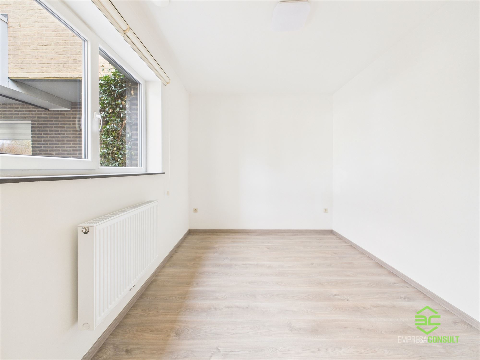 Instapklare gezinswoning met 3 slpk op 1km van het centrum! - foto 4