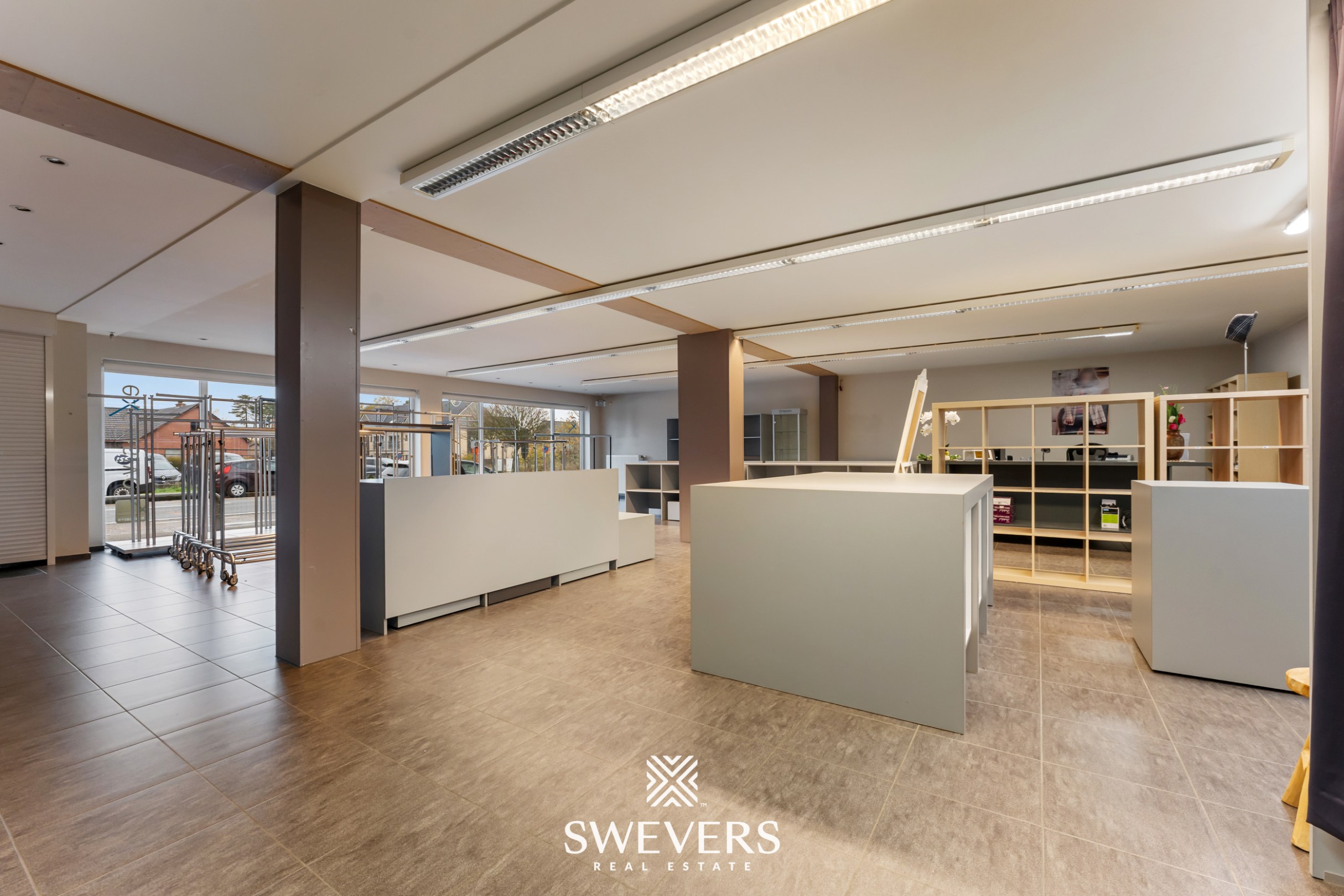 Opbrengsteigendom met handelspand, ruim appartement en uitbreidingspotentieel in hartje Heusden-Zolder - foto 4