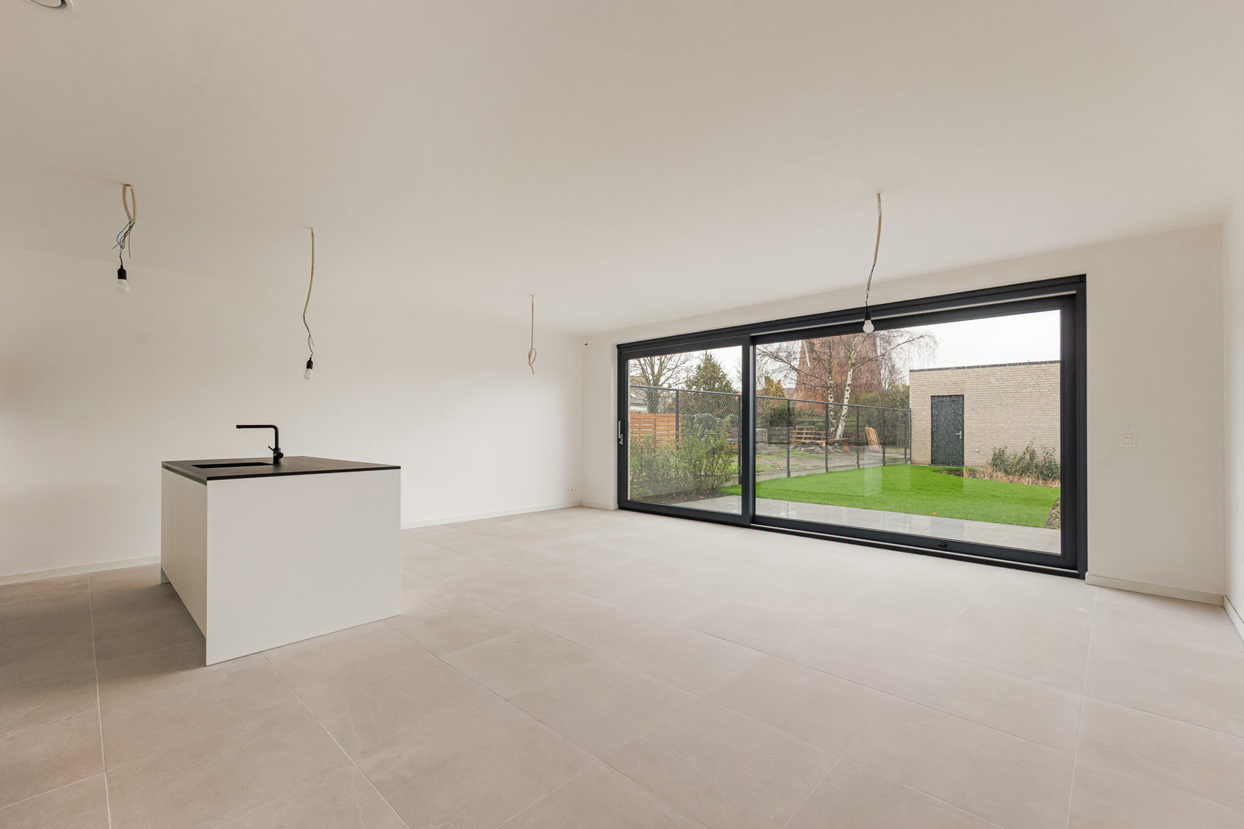 NIEUW gelijkvloersappartement met tuin en grote garage - foto 2
