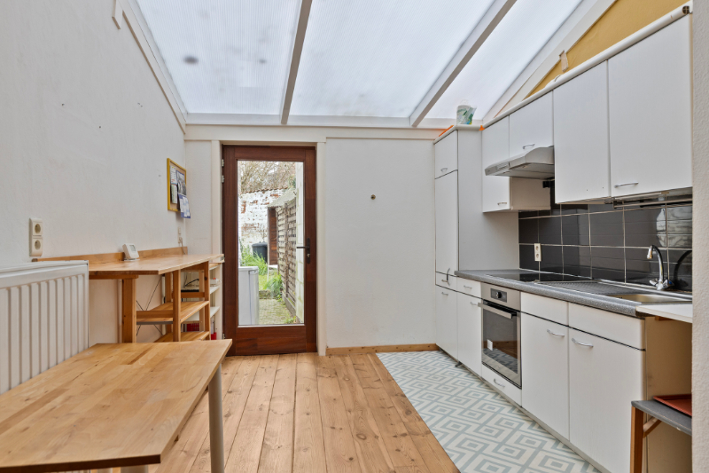 Gezellige instapklare stadswoning met 2 slaapkamers en tuin - foto 3