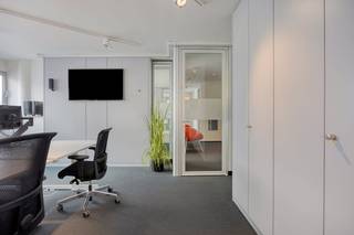 The office, located on the entire second floor, has several meeting rooms, office spaces for various employees and separate offices for...