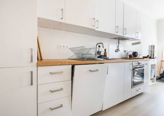 Located in Ixelles, in the sought-after University district, this bright renovated apartment of approx. 83 sqm is set on the 3rd and top floor of a charming small 1930s building.<br /><br />The building is well maintained: double glazing, roof and boiler renewed in 2010. Collective gas heating and compliant electrical installation. PEB : G. Currently rented under a one-year lease.<br /><br />A great opportunity close to universities, shops and public transport.<br />
<p><span>3rd floor</span>, named “appt 4” (LOT 8): Quotas 235/1000</p>
<ul>
<li>Entrance hall of approx. 5 sqm</li>
<li>Spacious and bright living room of approx. 31 sqm with open kitchen of approx. 5 sqm</li>
<li>Bathroom</li>
<li>Toilet with hand basin</li>
<li>Bedroom of approx. 14 sqm</li>
<li>Bedroom of approx. 10 sqm with access to the north-west facing terrace of approx. 3 sqm</li>
</ul>
<p>Private cellar: “lot 4”</p>