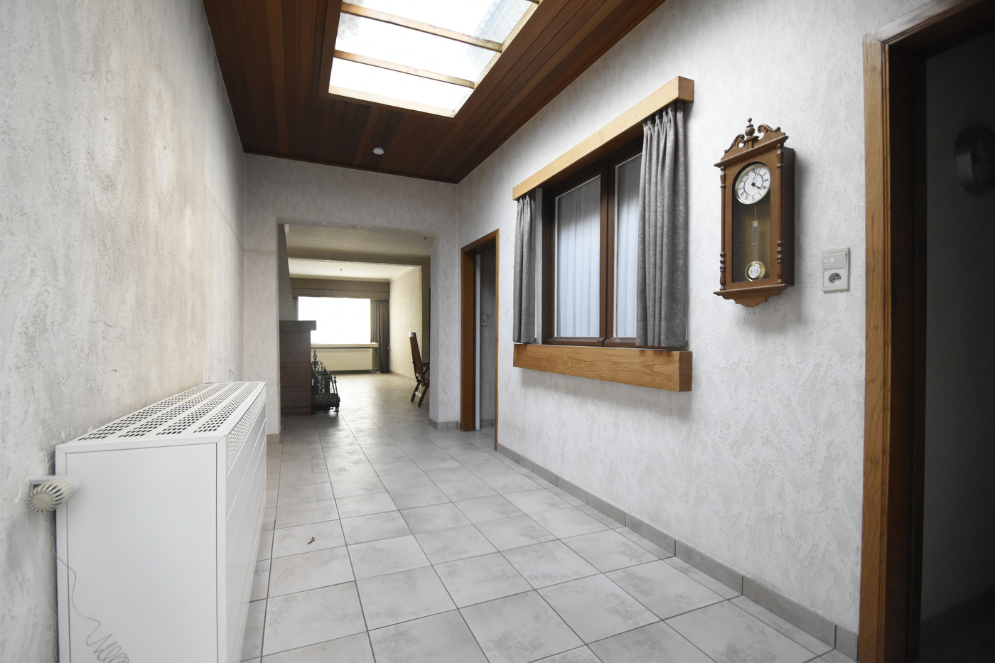 Op te frissen gezinswoning met 2 slaapkamers, ruime zolder en tuin - foto 4