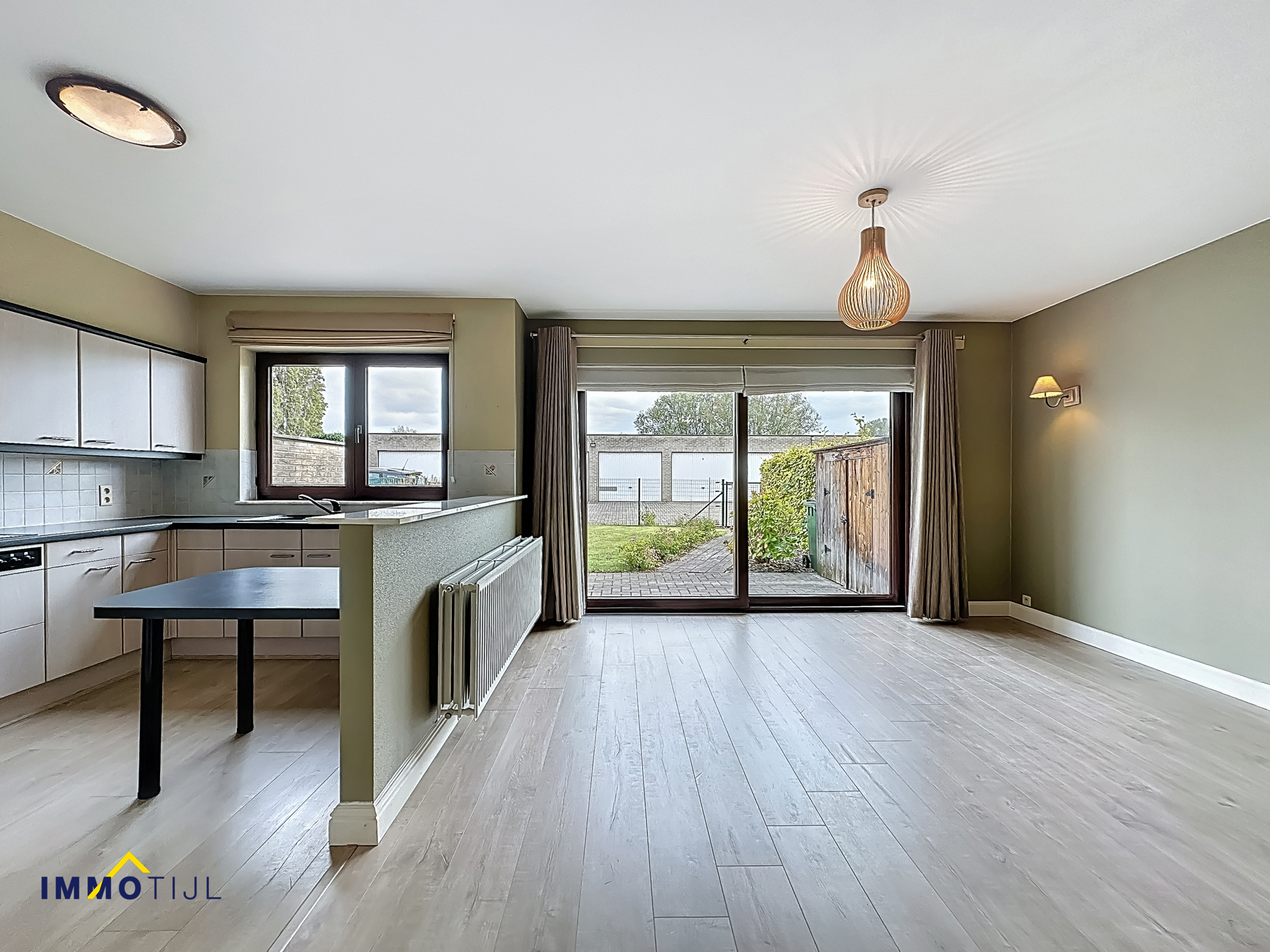 Ruim gelijkvloers appartement met privétuin en staanplaats! - foto 2