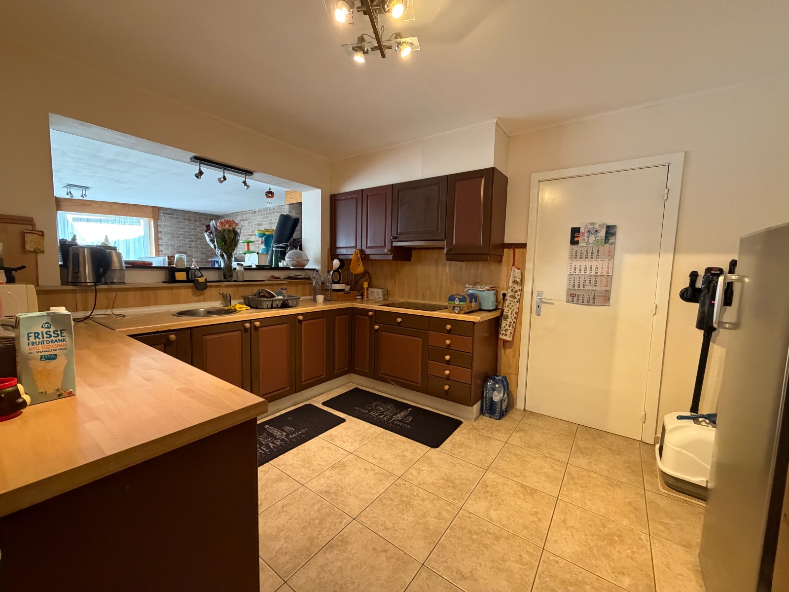 Ruime gezinswoning met 3 slaapkamers, grote tuin en garage - photo 4