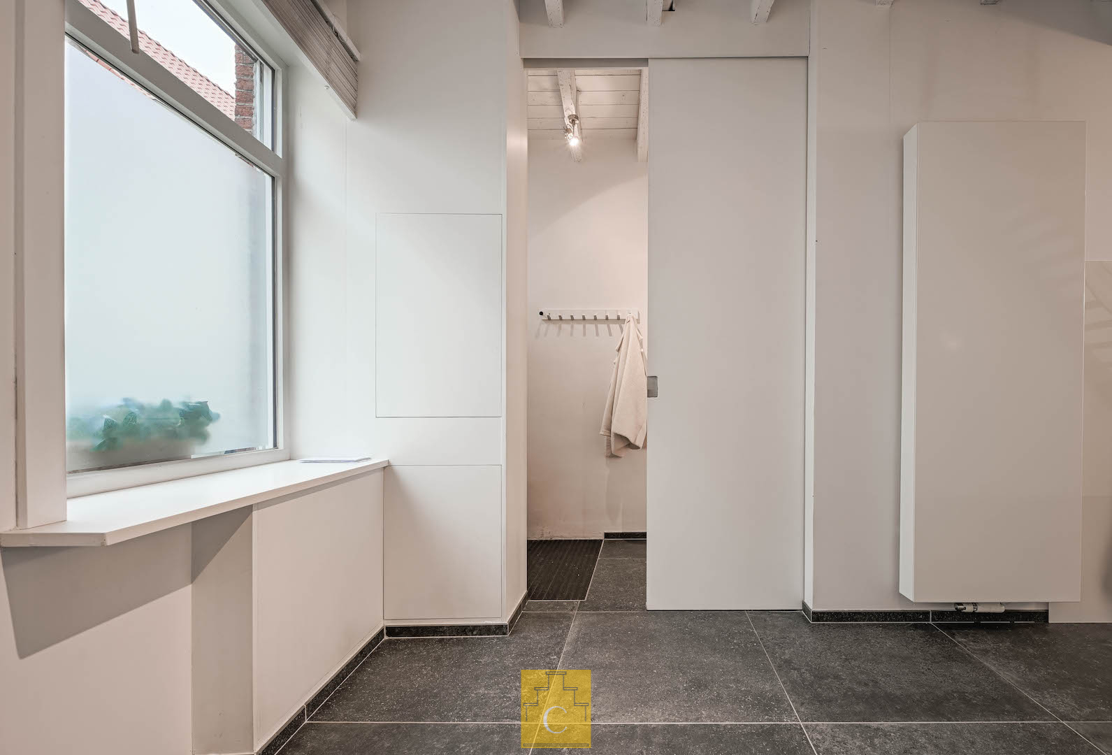 Trendy stadswoning - totaalrenovatie, strakke lijnen en een keitof terras - topligging Moerstraat - foto 4