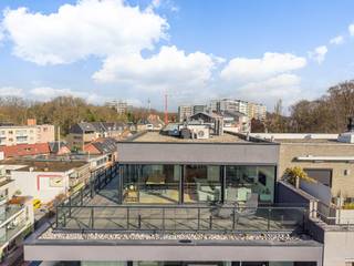 Exclusief luxe appartement (120 m²) met ruim terras (75m²) gelegen in het centrum van Genk, inclusief dubbele staanplaats en ruime kelderberging in...