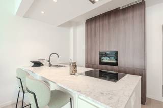 Beautiful two-bedroom apartment with side sea view for sale located in a prime location in the center of Middelkerke! The renovated apartment...