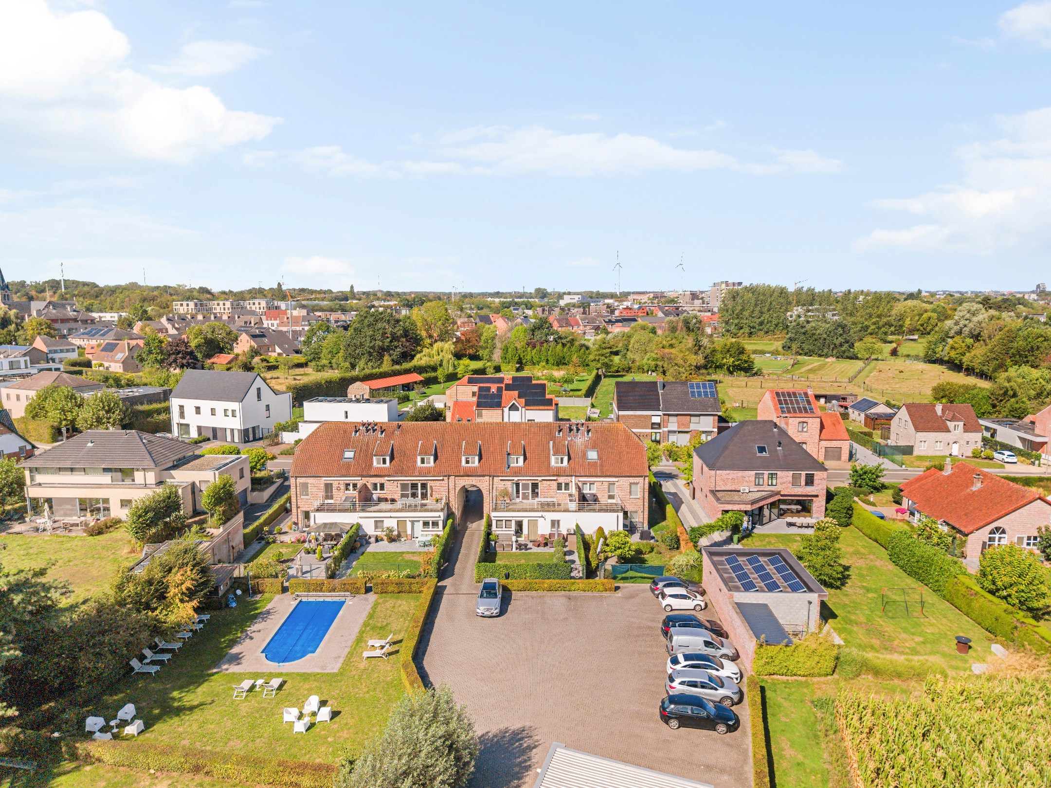 Instapklaar en perfect afgewerkt duplex appartement met 3 slpks/ruim terras en gemeenschappelijke tuin met zwembad te Hasselt. - foto 5