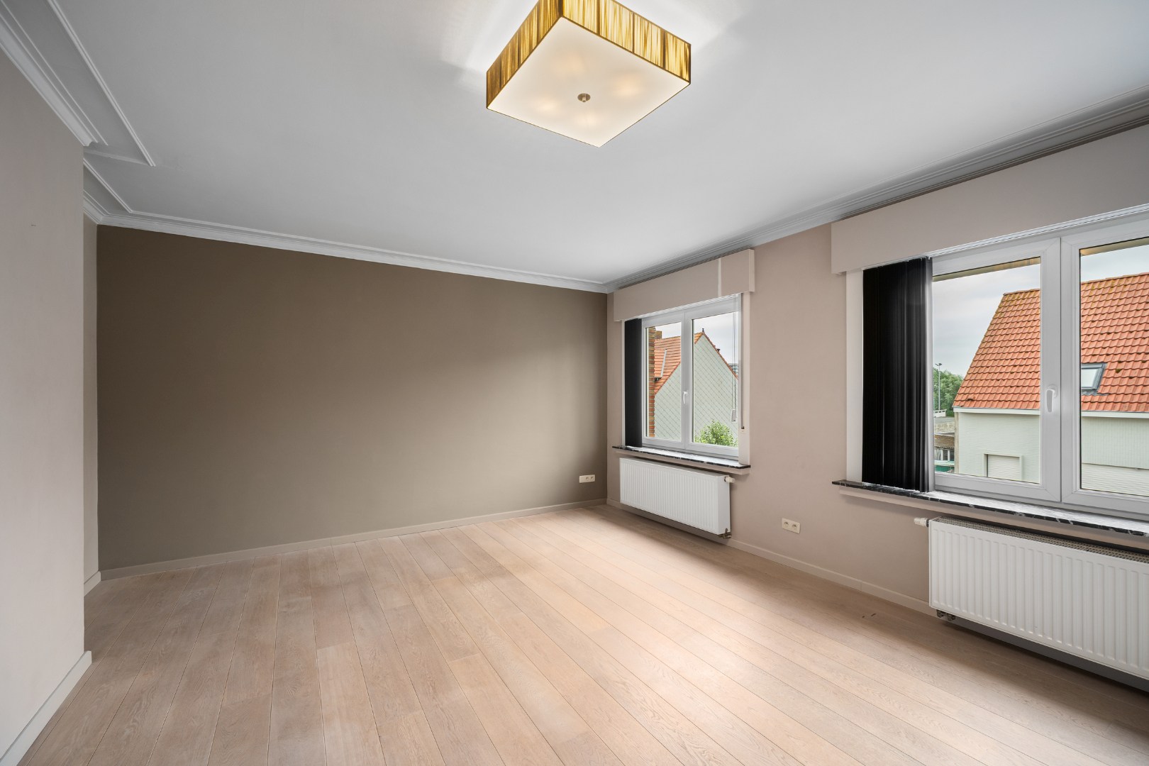 Instapklaar en lichtrijk appartement met terras in het centrum van Heist. - foto 5