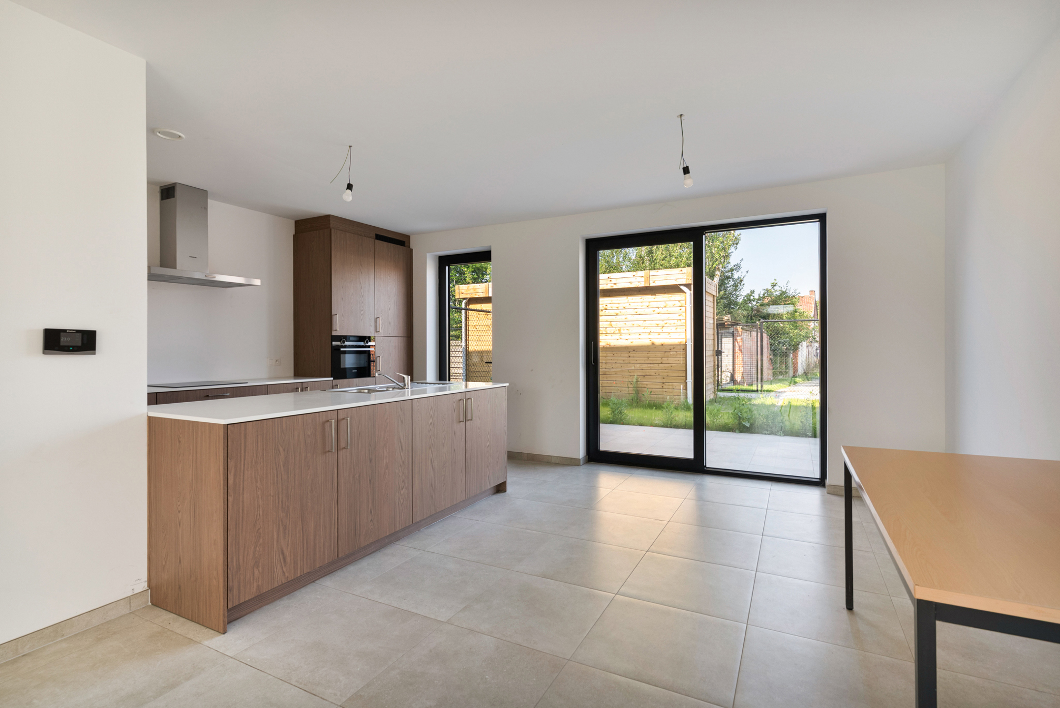 Nieuwbouwwoning met 3 slpks, tuin en ondergrondse parking - foto 4