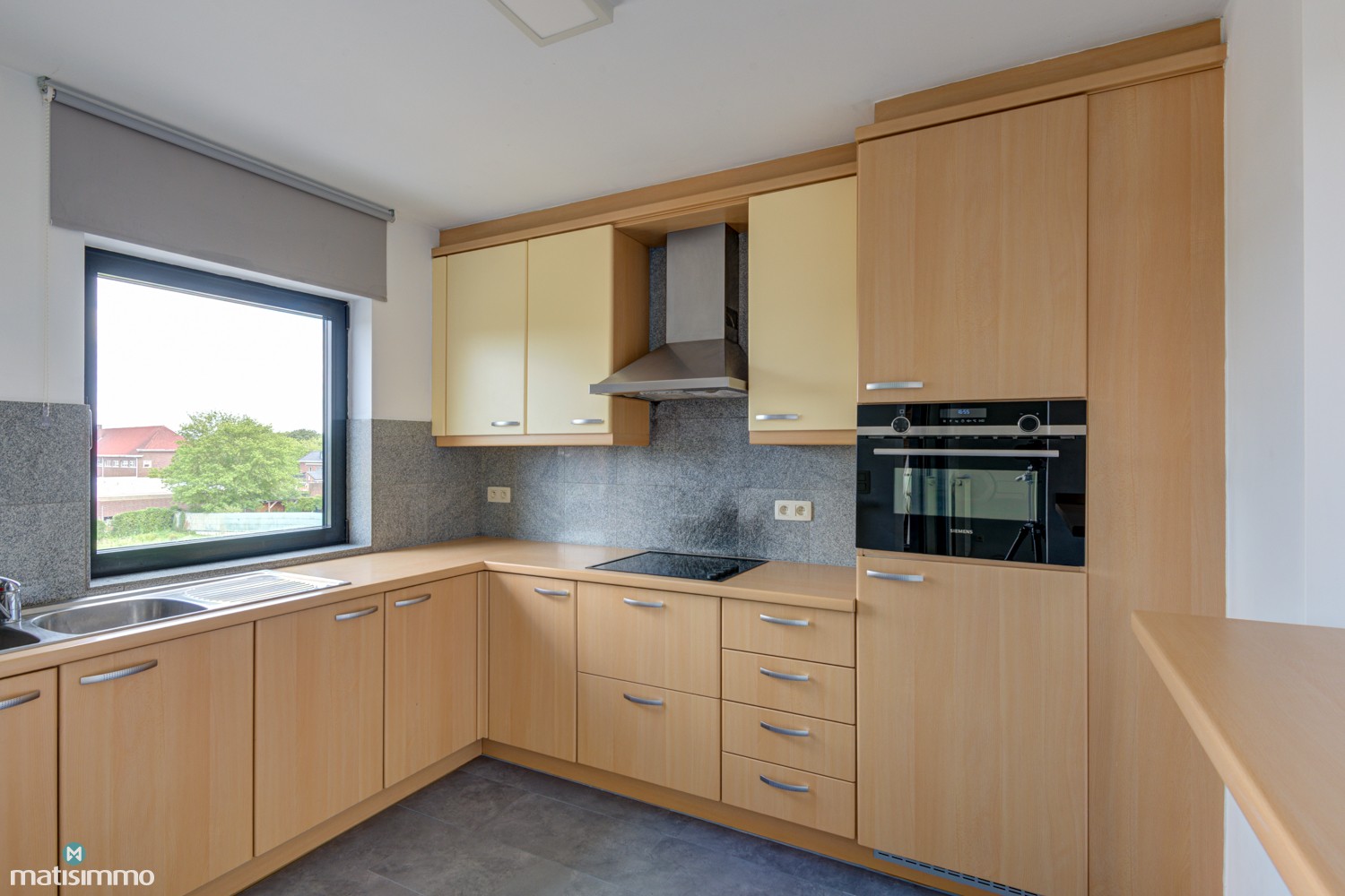 DUPLEXAPPARTEMENT MET 2 SLAAPKAMERS, 2 TERRASSEN EN GARAGEBOX AAN HET CENTRUM VAN BILZEN - foto 5
